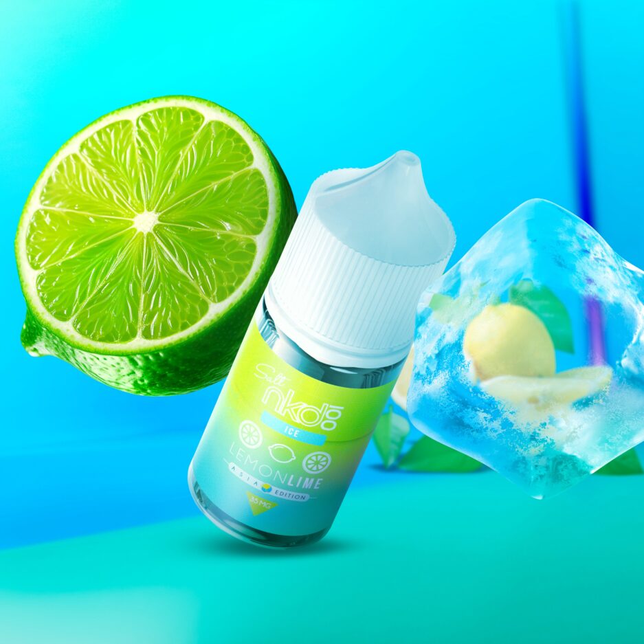 Lemon Lime angled at the center in a neon blue setting with a sliced lime and ice cube at the sides of the bottle, with a bundle of lemons ion the floor n the background.