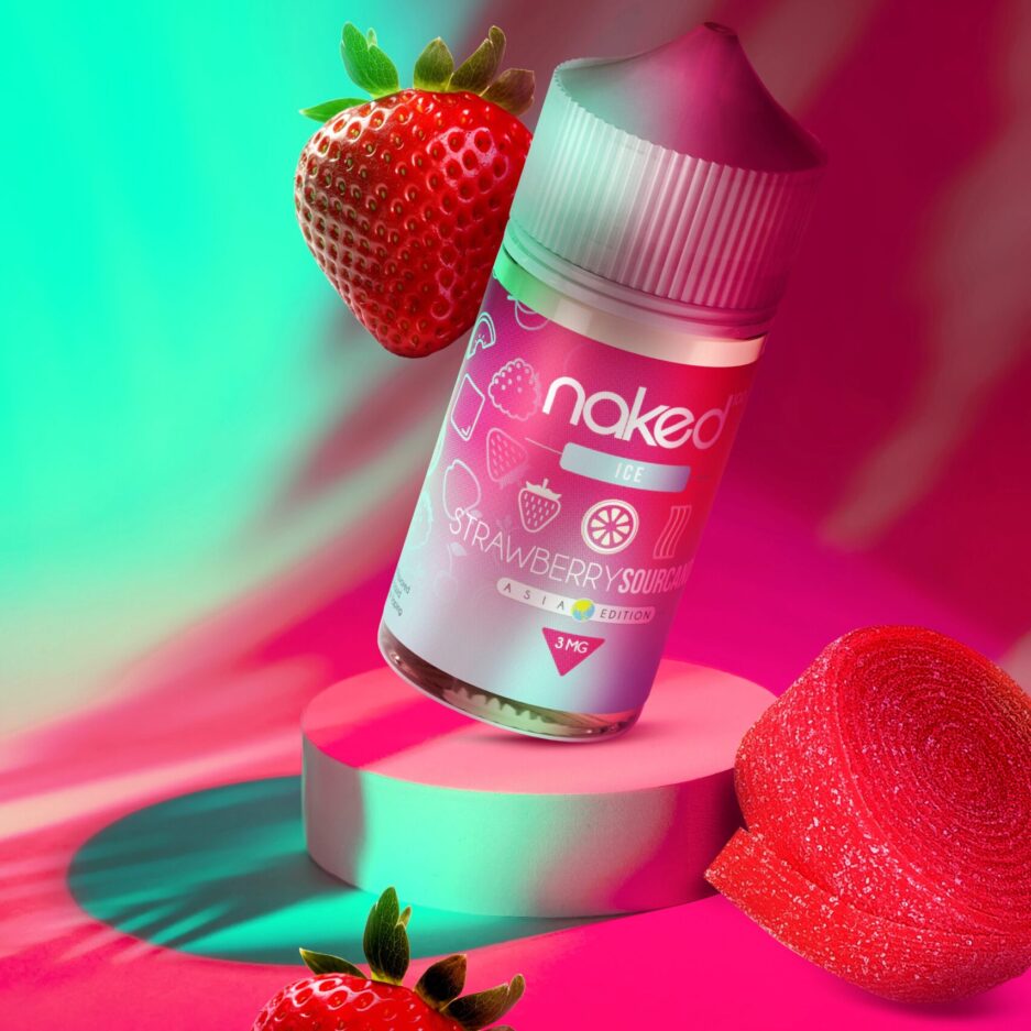 Standing angled on a platform, Strawberry Sour Candy is illuminated by neon lights, dramatic lighting with shadows, strawberries and a roll of sour candy are all next to the platform facing the bottle.