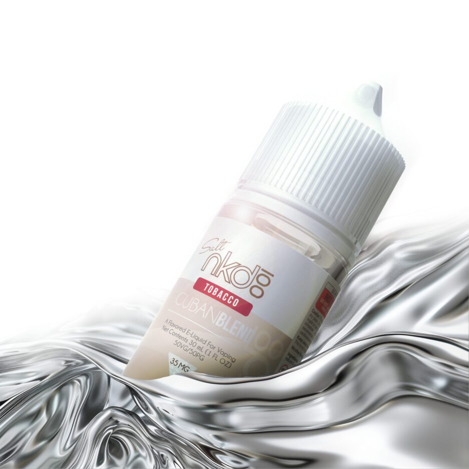 Cuban Blend is floating in a sea of silver liquid with a seamless white background illuminating the area.