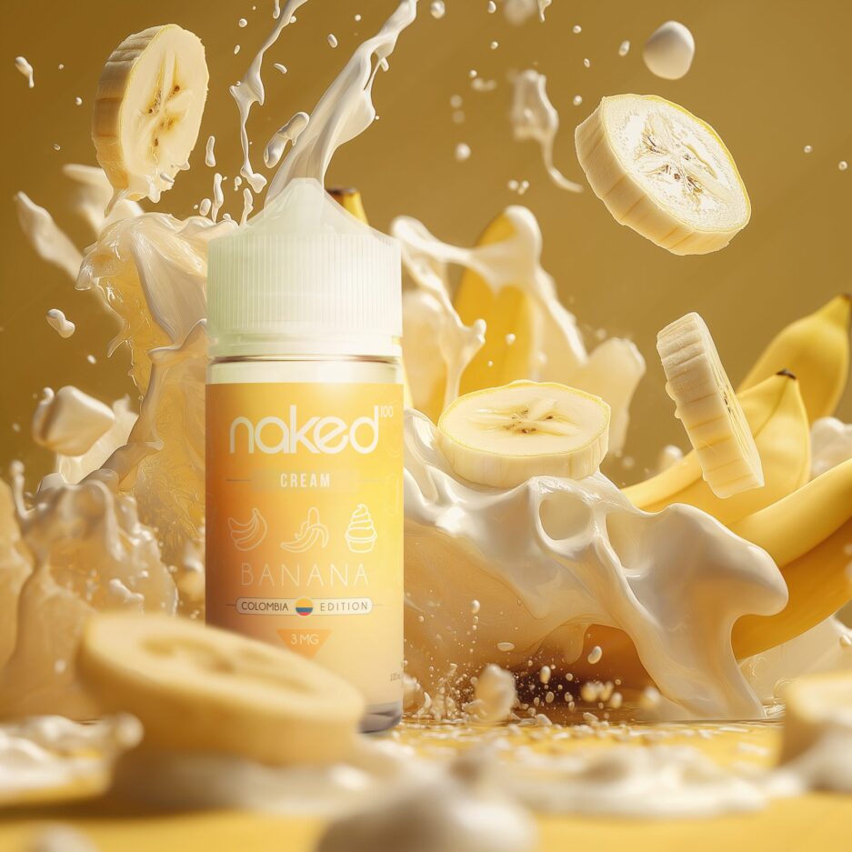 A product shot with yellow color tones, Naked 100 Colombia's Banana Stands center left of the image with light from the right bouncing off the bottle. A big splash of bananas mixed with cream is set right behind the bottle, with some banana slices mixed with cream are blurred in the foreground.