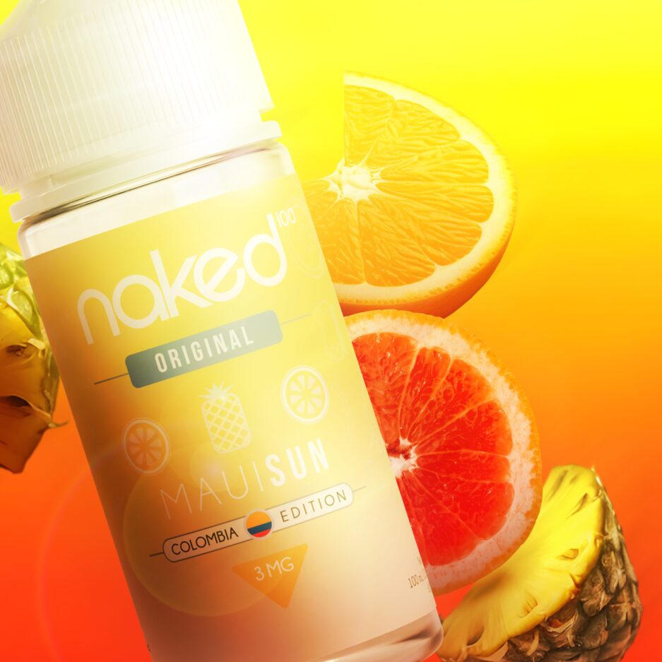 A tight product shot with Naked100 Colombia's Maui Sun 60mL at the foreground floating with an orange, tangerine, and pineapple sitting on the right of the bottle. The image has orange and yellow sunset tones with the background encapsulating those colors with a seamless gradient.