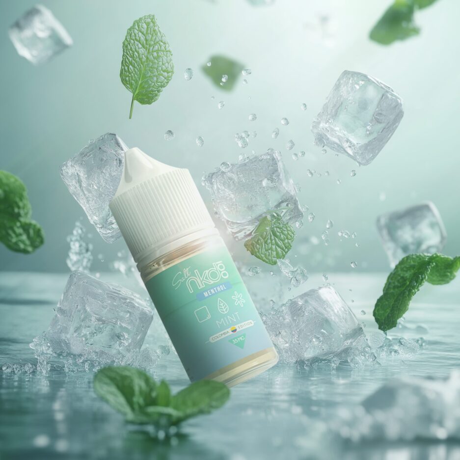 A product shot in a neutral cool color tone environment with the floor flooded with cool water. Ice cubes and mint leaves are falling and splashing into the water with Naked100 Colombia's Mint is falling into the water as well.