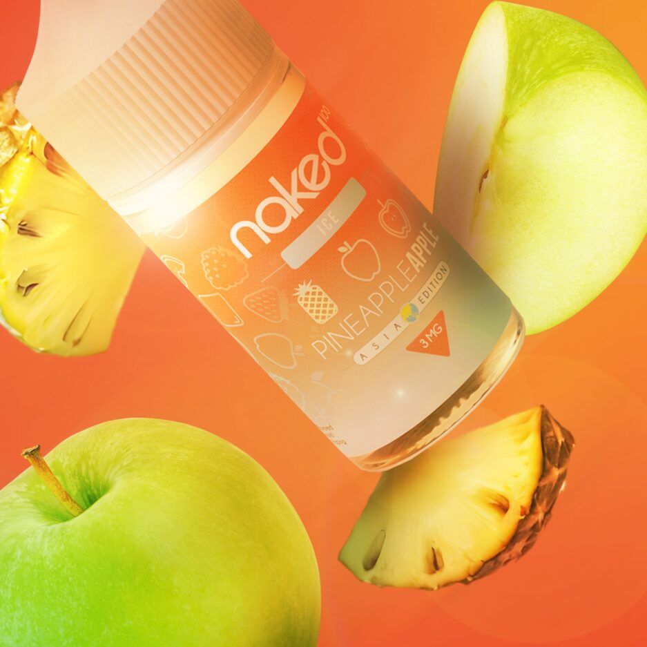 A product shot with an orange color tone, orange background gradient with Naked100 Colombia's Pineapple Apple bottle in the middle of the image floating as green apples and pineapple slices surround it.