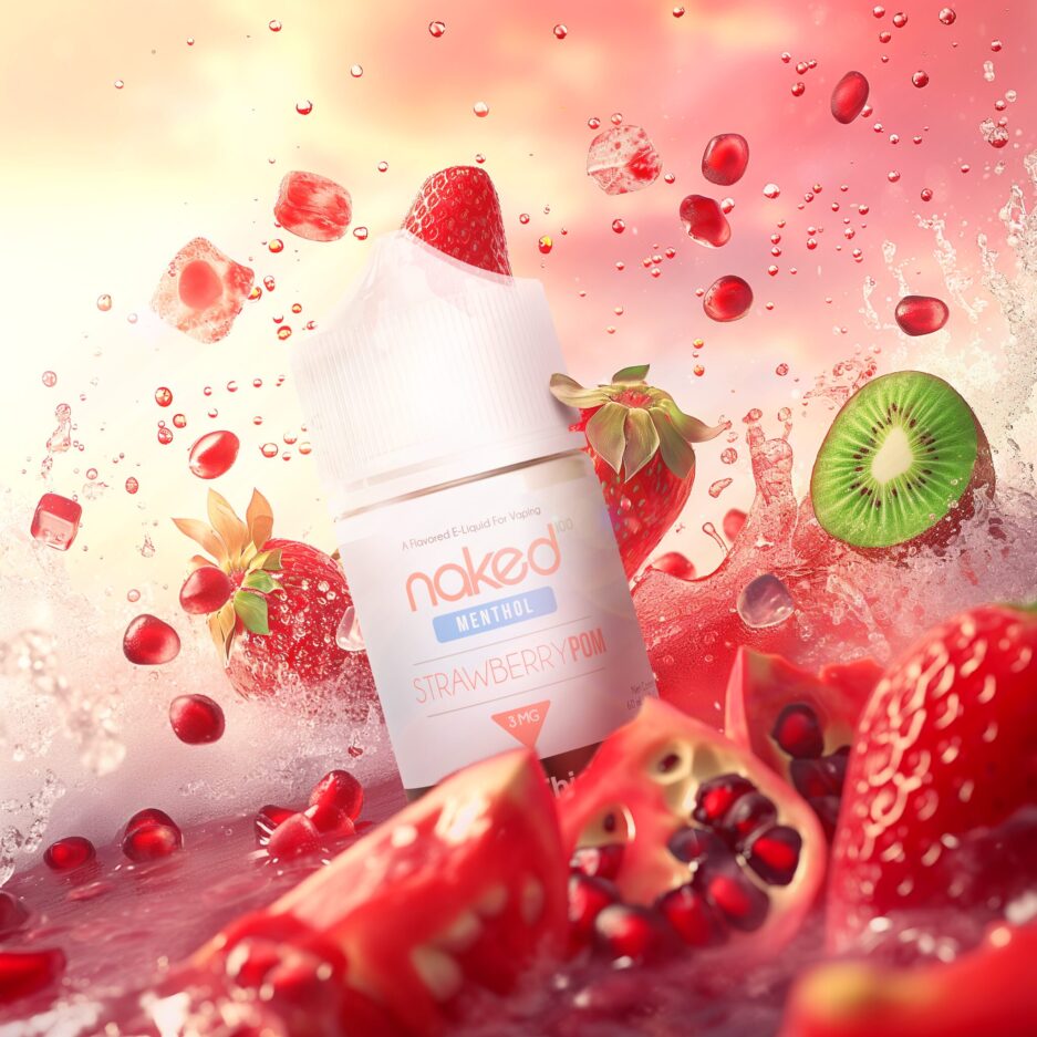 A product shot set in a red ocean of pomegranate, strawberry, and kiwis with Naked100's Strawberry Pom international 60mL bottle splashing into the middle of the image. Strawberries splash behind the bottle with kiwis peeking through the right splashing out of the liquid, along with Pomegranates blurred out in the foreground with pomegranate seeds flying in the air as well. The background has a red almost sunset like sky to match the same color of the product.